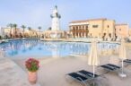 Panoramic pool view of Aliathon Holiday Village Resort