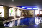 Indoor pool with rocky surroundings