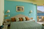 Relax in your colourful room in Akti Olous