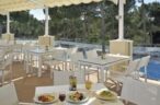 Have your breakfast or snack in Iberostar Club Cala Barca's outdoor restaurant!