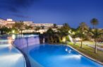 Enjoy the magic view of the floodlit pool from your balcony in Iberostar Costa Calero