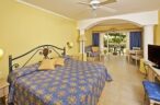 Relax in your pleasant room at Iberostar Hacienda Dominicus