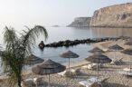 Fantastic sandy beach with umbrellas and sunbeds