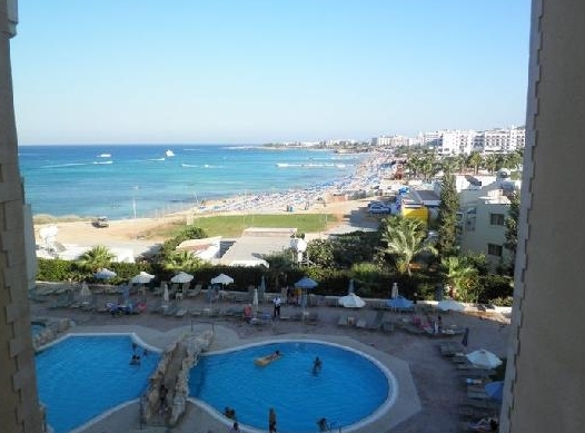 Panoramic pool view of The Rising Star Hotel Apartments