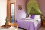 Relaxing in your colourful room at Socrates!